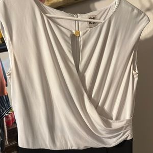 White top and black bottoms , jump suit. Size 4